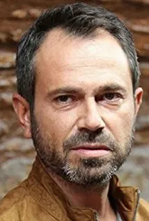 Фотография актёра Олгун Шимшек