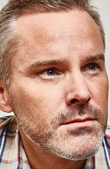 Фотография актёра Роджер Крэйг Смит