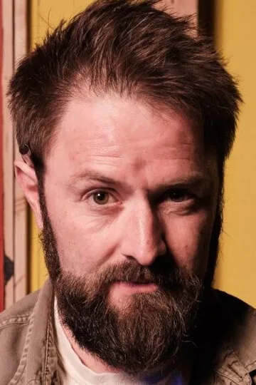 Фотография актёра Адам Кэйтон-Холлэнд